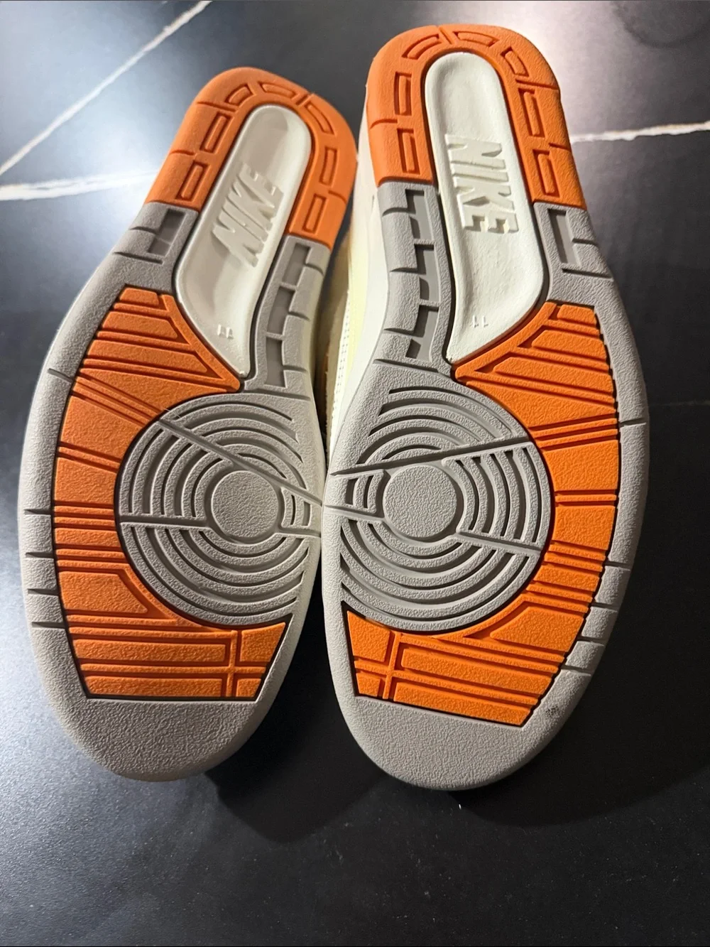 Jordan White and Orange Low-Top Sneakers with Gold Logo Accent